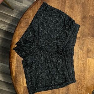 Stars above black shorts